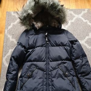 Pajar winter coat with real fur. Bought it here and never used it.